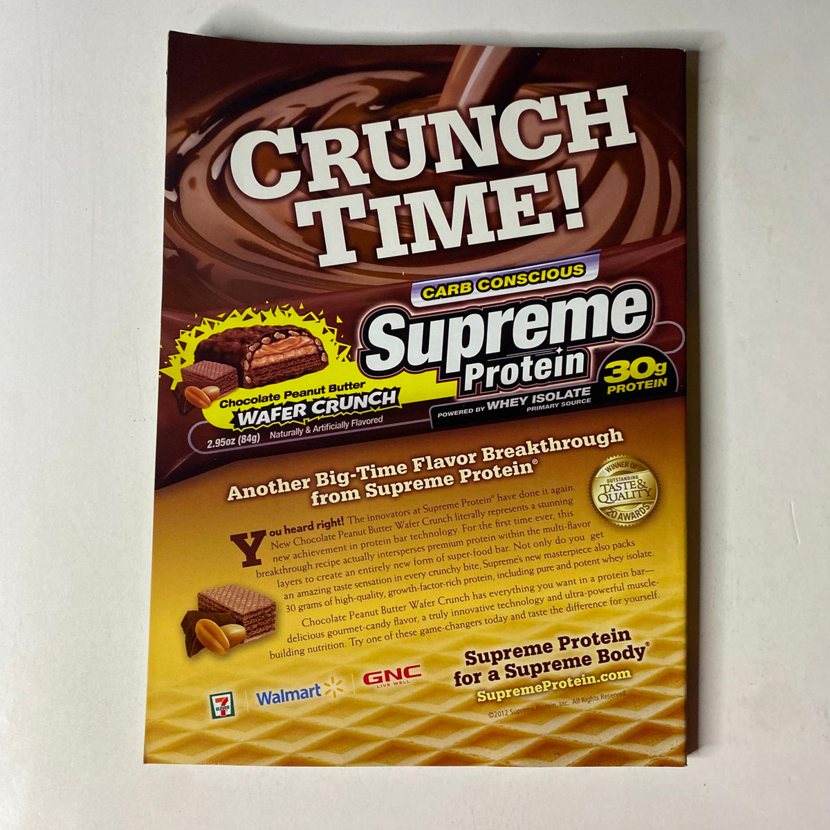 MuscleMag International Magazine June 2012 showcasing an advertisement for Supreme Protein with a focus on their chocolate peanut butter flavor and nutrition details, emphasizing 30 grams of protein per serving.