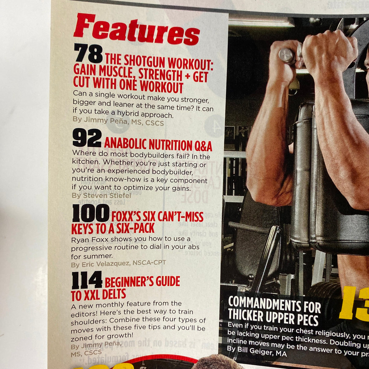 Inside features of MuscleMag International Magazine July 2012, including articles on hybrid workouts, nutrition Q&A, and ab routines.