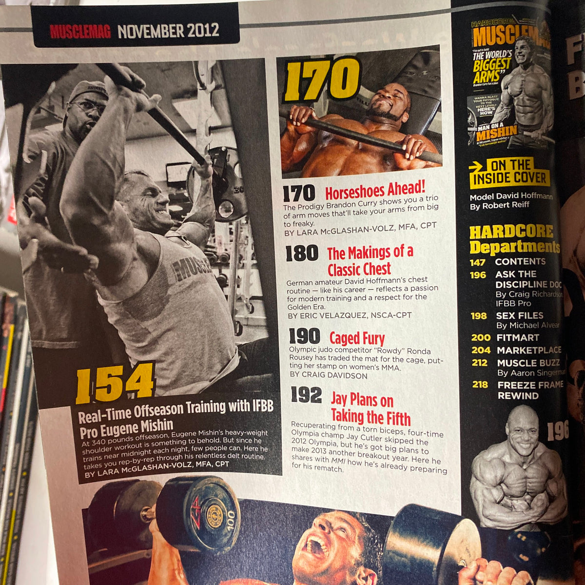 Another interior page from MuscleMag International Magazine November 2012, featuring content on advanced training techniques, including 'The 7x7 System: Building Muscle & Strength at the Same Time' by Jimmy Peña, MS, CSCS, along with other training insights.