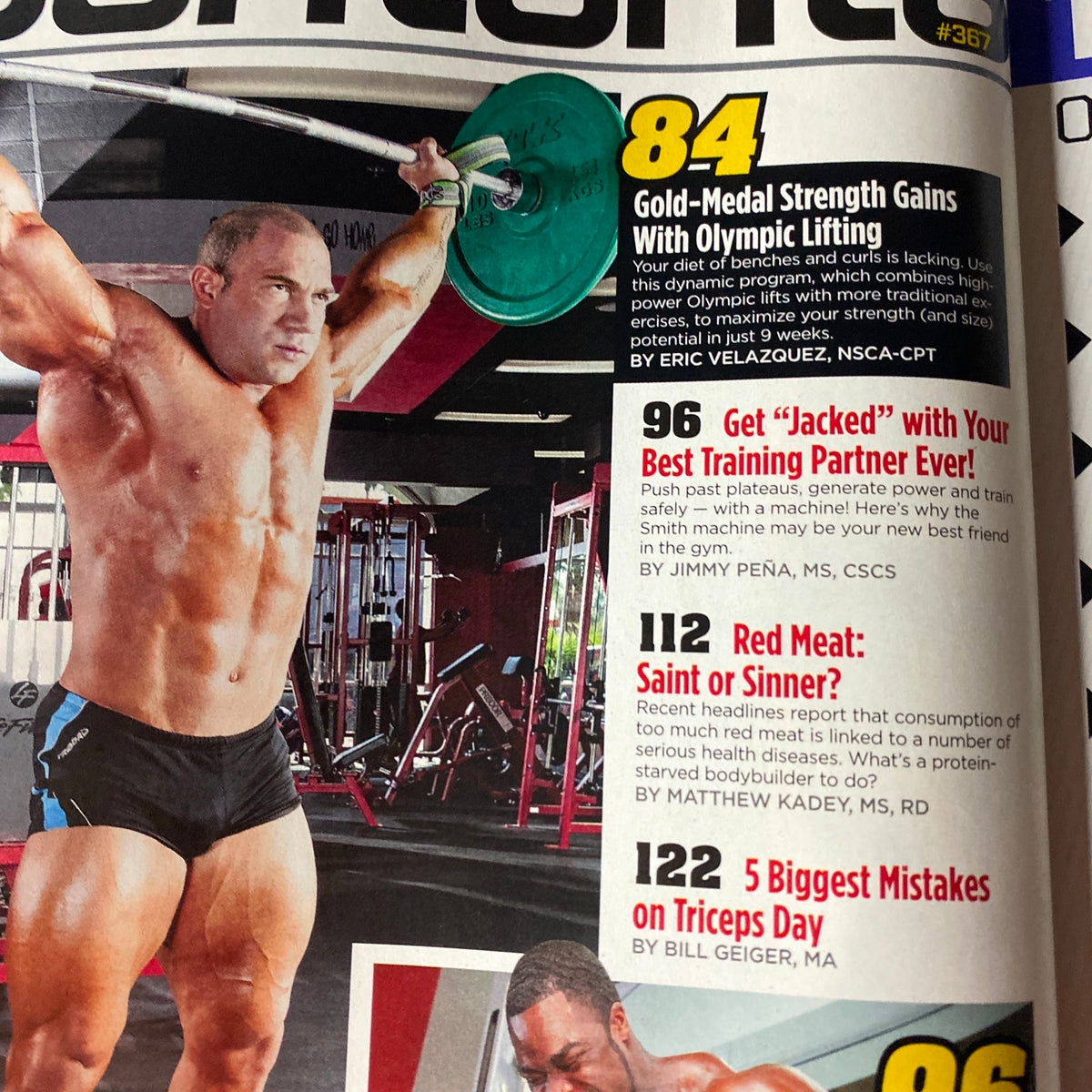 Interior page from MuscleMag International Magazine December 2012 highlighting training programs like 'Gold-Medal Strength Gains With Olympic Lifting' and nutrition insights.