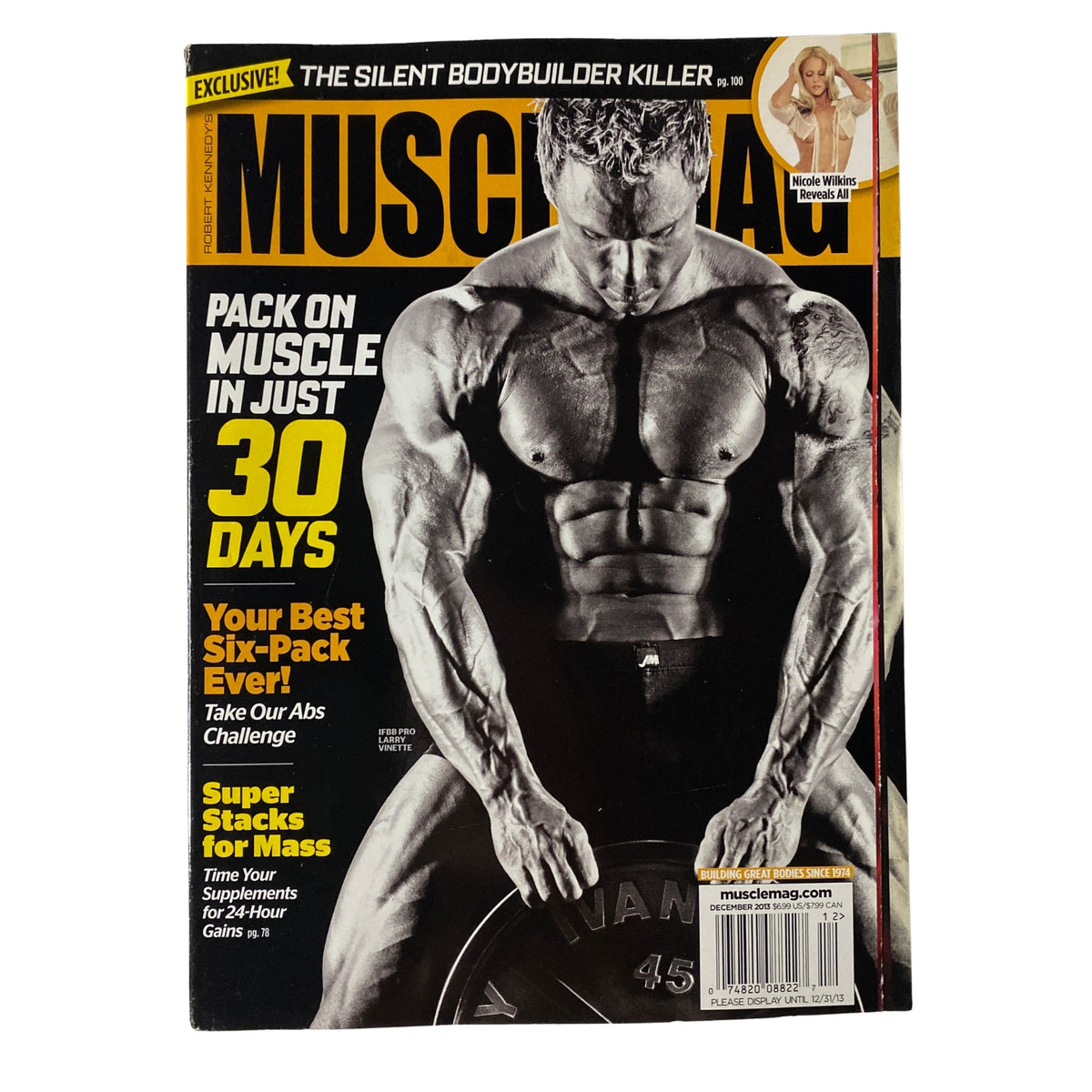 Cover of MuscleMag International Magazine December 2013 featuring a muscular male bodybuilder showcasing strength. Title: MuscleMag International Magazine December 2013 Larry Vinette No Label VG.