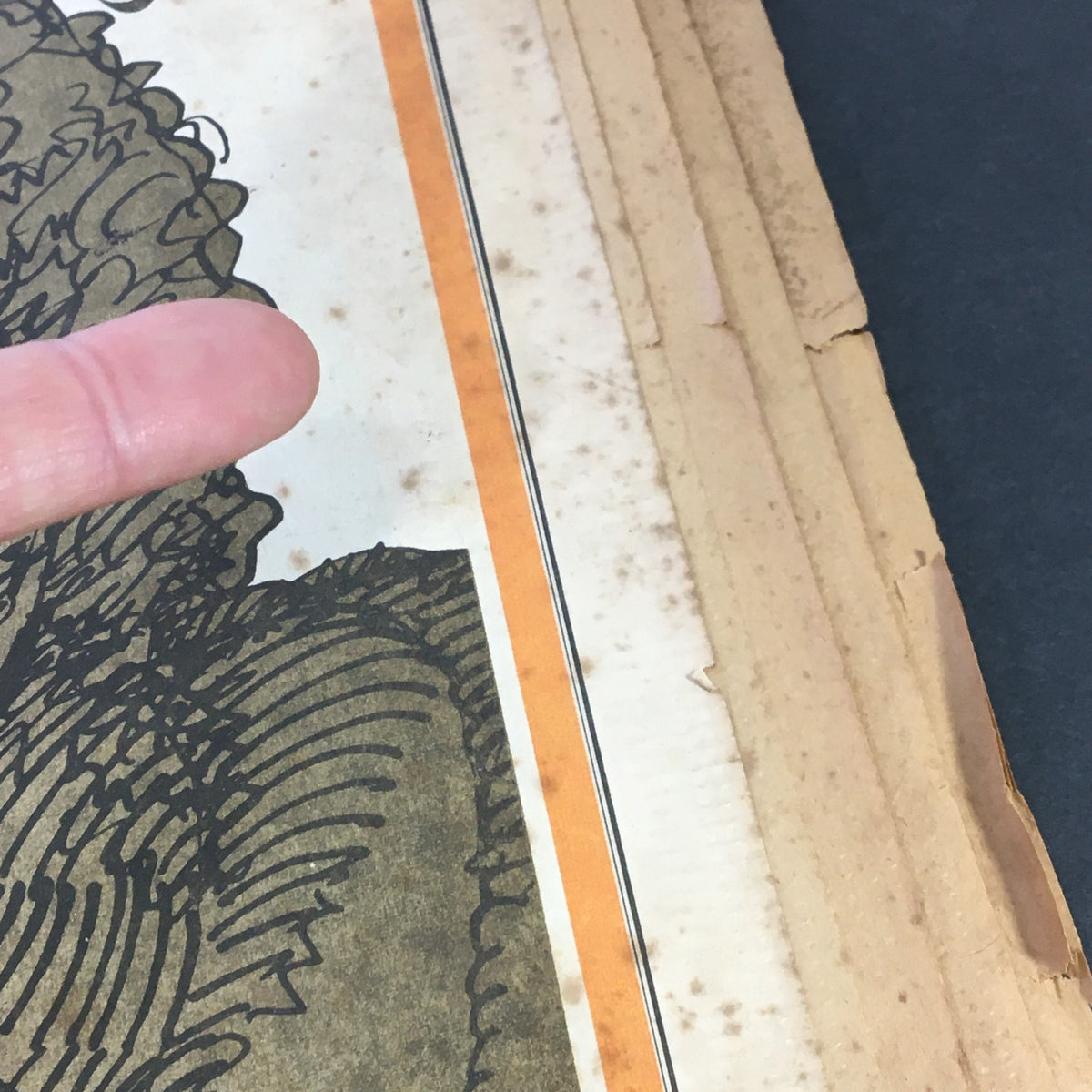 Detailed image of the edge of the Rolling Stone Newspaper from March 2, 1972, highlighting the vintage condition and artistic cover featuring Bob Dylan.