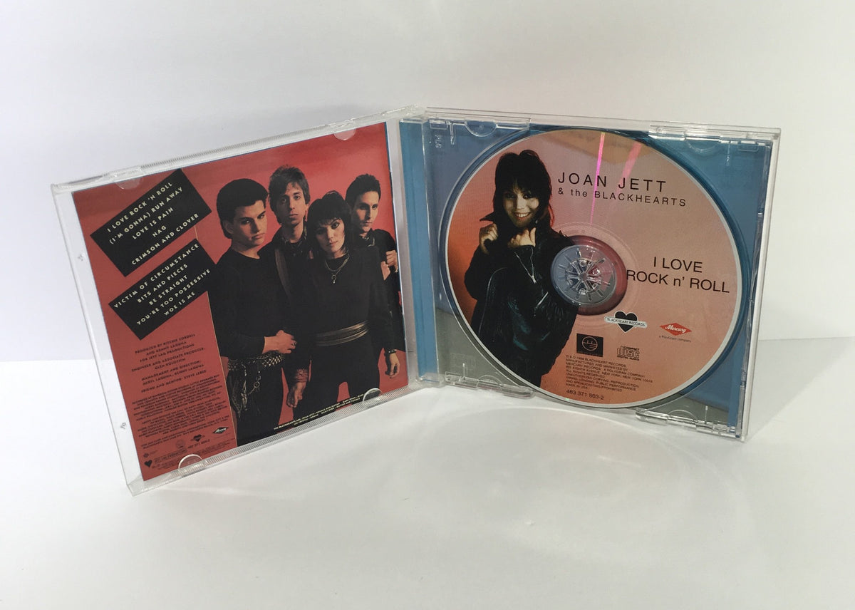 Inside view of Joan Jett The Blackhearts Audio CD, displaying the disc and album artwork featuring the band members.