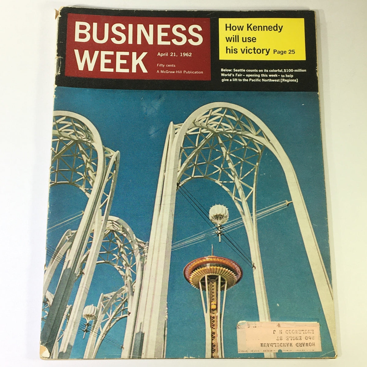 Cover of VTG Business Week Magazine from April 21, 1962 featuring an iconic Seattle skyline with the Space Needle, capturing John F. Kennedy's influence on business and the Pacific Northwest.