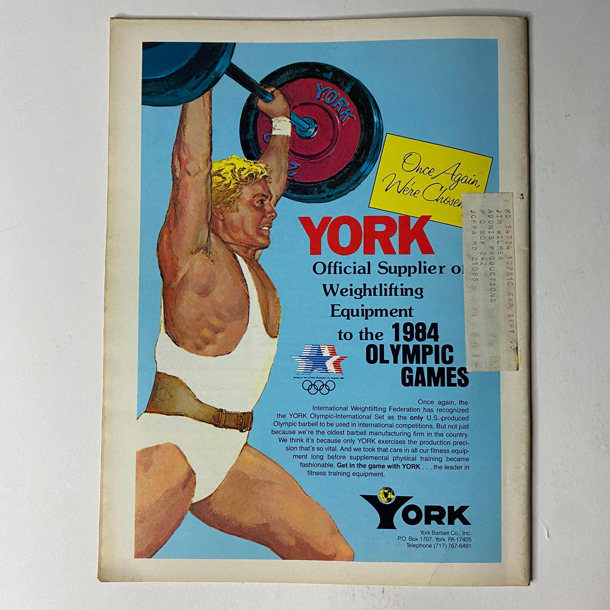 Advertisement for York Weightlifting Equipment in Muscular Development Magazine June 1984, promoting the brand's involvement in the 1984 Olympic Games.