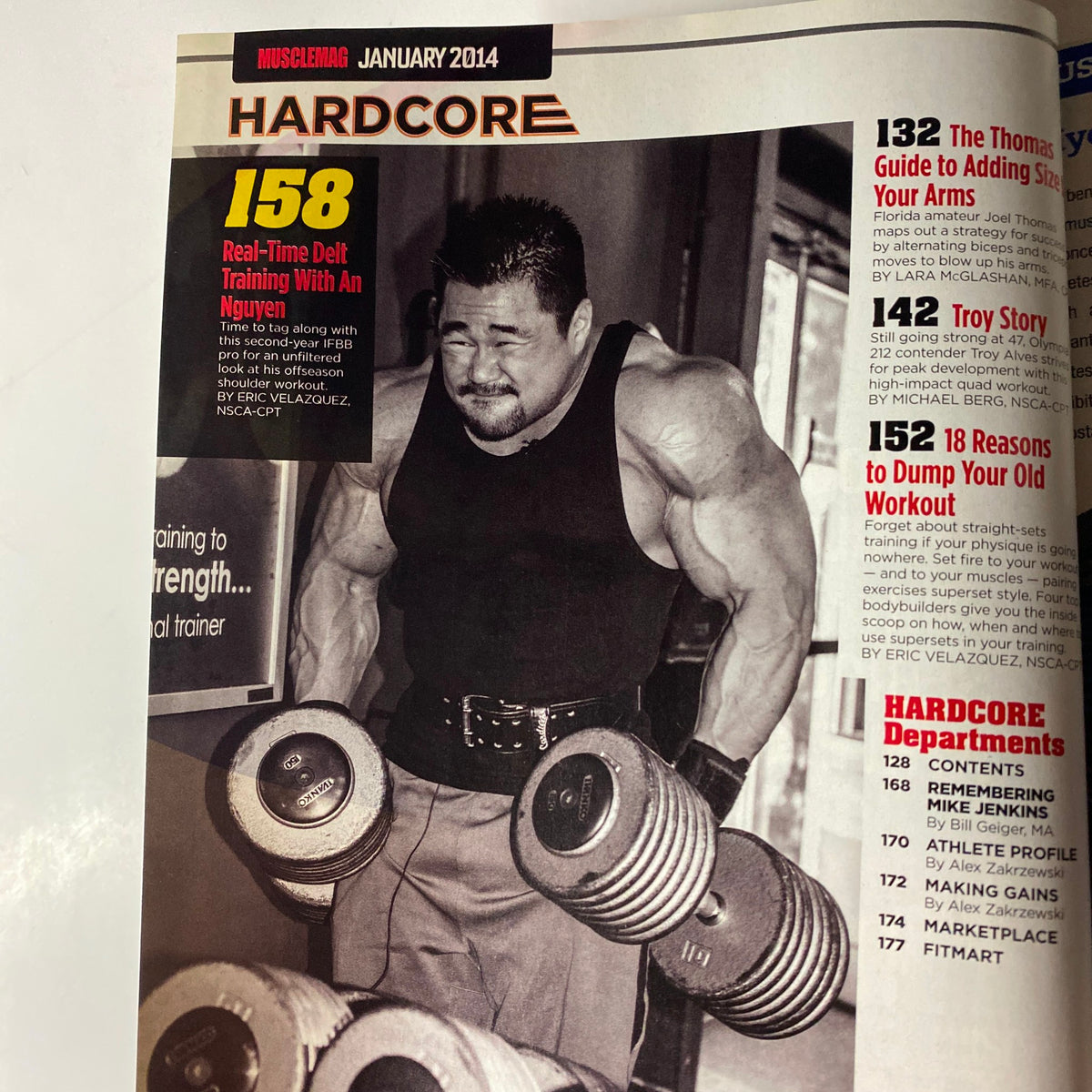 Another inside page of MuscleMag International Magazine January 2014 detailing advanced training techniques and workout strategies.