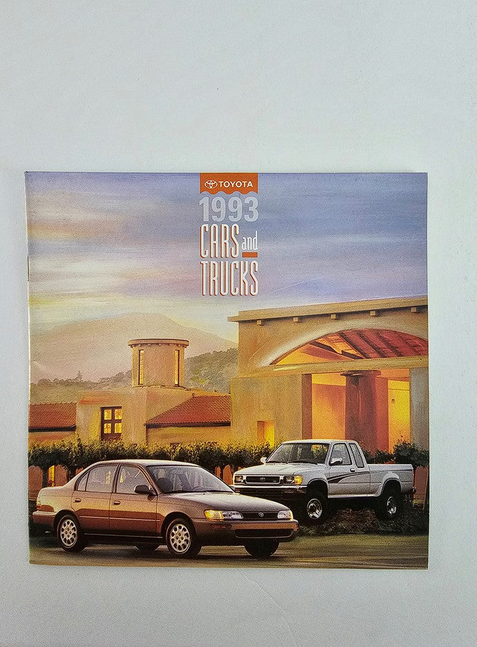 1993 Toyota Cars and Trucks Sale Brochure Catalog featuring a scenic view of a Toyota sedan and truck parked in a picturesque setting with architecture in the background.