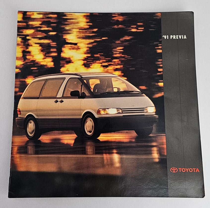 Cover of the 1991 Toyota Previa 2.4L 2AZ-FE Car Van Sale Brochure Catalog featuring the Previa van, showcasing its design against a blurred background of autumn foliage.