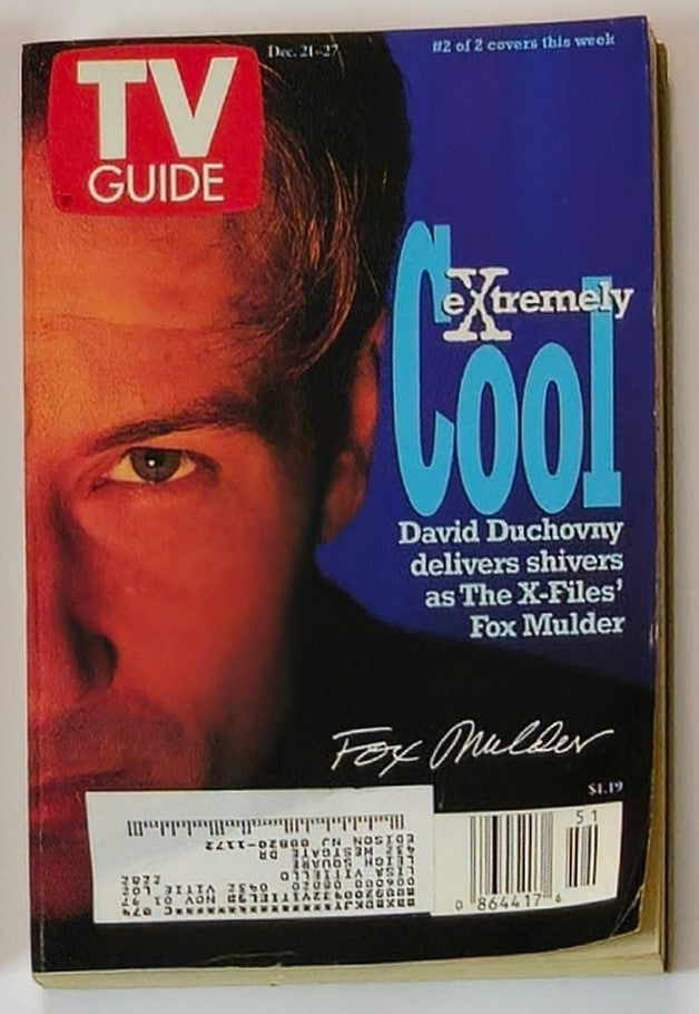 Cover of TV Guide Magazine December 21, 1996 featuring David Duchovny as Fox Mulder from The X-Files, showcasing a striking blue backdrop and bold text stating 'eXtremeLy Cool'.