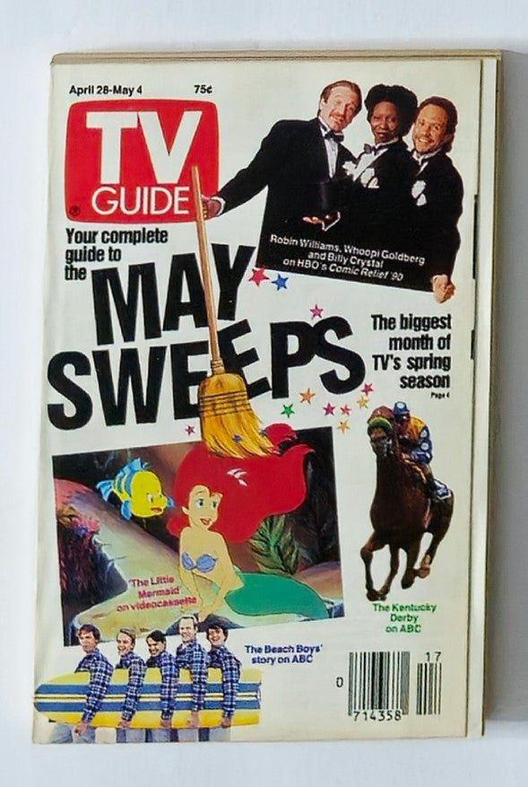 Cover of TV Guide Magazine April 28, 1990, featuring Robin Williams, Whoopi Goldberg, and Billy Crystal, promoting HBO's Comic Relief 90, highlighting the May sweeps period of television.