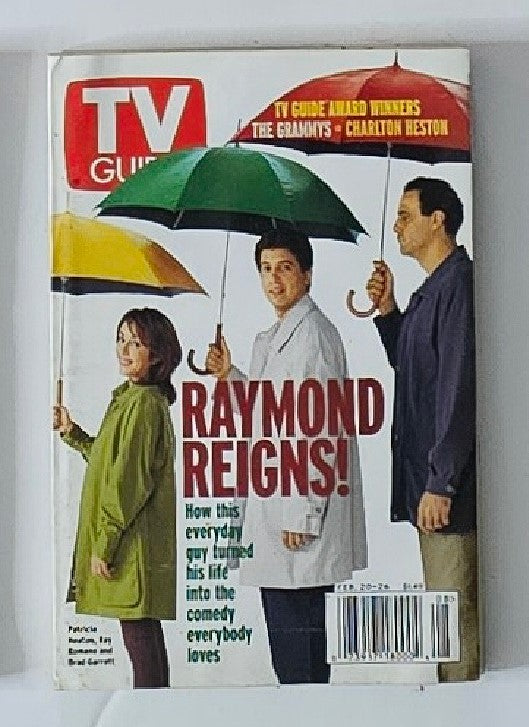 TV Guide Magazine February 20 1999 featuring Patricia Heaton on the cover, showcasing the iconic cover story 'Raymond Reigns!' with three characters holding colorful umbrellas. A nostalgic representation of late 90s television culture.