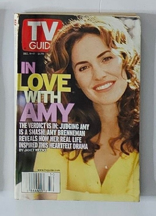 Cover of TV Guide Magazine December 11 1999 featuring Amy Brenneman with the headline 'In Love With Amy'. This vintage issue showcases the actress and highlights her role in the acclaimed show 'Judging Amy', making it a collectible piece of television history.