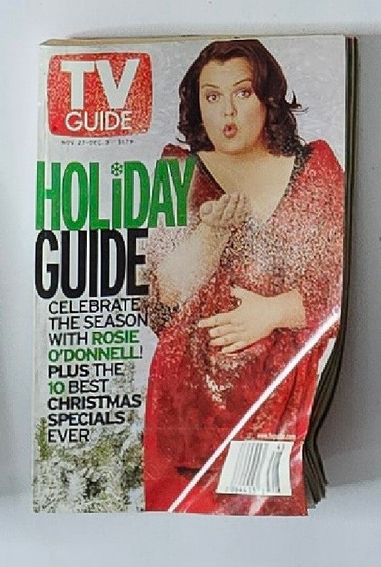 TV Guide Magazine cover from November 27, 1999 featuring Rosie O'Donnell celebrating the holiday season. The magazine highlights exclusive features, including the 10 best Christmas specials ever.