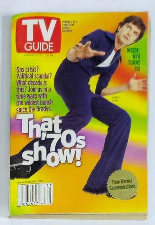 TV Guide Magazine featuring Topher Grace on the cover from August 4, 2001. The cover displays vibrant colors and headlines about popular shows, illustrating early 2000s television culture.