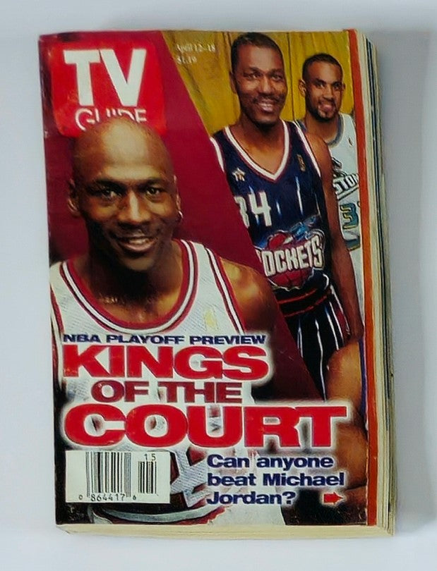 Cover of TV Guide Magazine from April 12, 1997, featuring Michael Jordan, titled 'Kings of the Court - NBA Playoff Preview', highlighting key basketball figures and the question 'Can anyone beat Michael Jordan?'. This vintage magazine captures the essence of 1990s sports culture.
