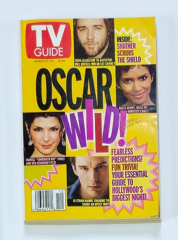 TV Guide Magazine March 23 2002 featuring Halle Berry, Russell Crowe, and Marissa Tomei on the cover, showcasing Oscar coverage and Hollywood trivia.