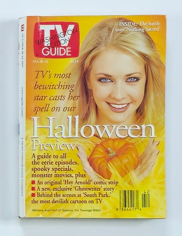 TV Guide Magazine October 18 1997 featuring Melissa Joan Hart on the cover, showcasing a Halloween preview theme. The magazine highlights Halloween specials, spooky episodes, and includes a promotional image of Melissa Joan Hart, recognized for her role in Sabrina, the Teenage Witch.
