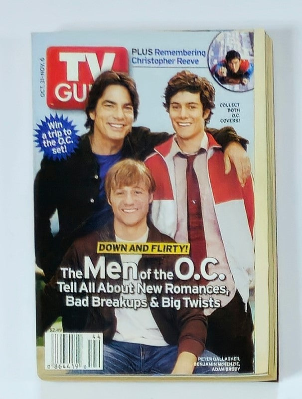 TV Guide Magazine featuring Peter Gallagher on the cover, dated October 31, 2004. The cover showcases three actors from the series 'The O.C.' and highlights features about new romances, breakups, and twists in the show.