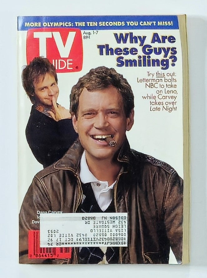 Cover of TV Guide Magazine from August 1, 1992 featuring Dana Carvey and David Letterman with the title 'Why Are These Guys Smiling?'. The cover highlights their comedic presence and includes details about Letterman's transition from NBC to Leno, reflecting the television culture of the early '90s.