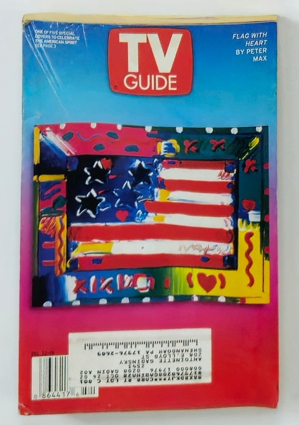 TV Guide Magazine December 22 2001 featuring Flag with Heart design by Peter Max, showcasing a colorful illustration with American flag elements and a festive theme.