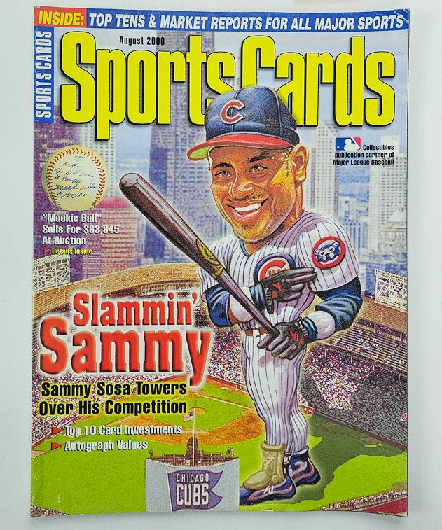 Cover of Sports Cards Magazine from August 2000 featuring Sammy Sosa, titled 'Sammy Sosa Towers Over Competition.' The cover showcases Sosa with a baseball bat in hand, representing his legendary status in baseball during an iconic season.