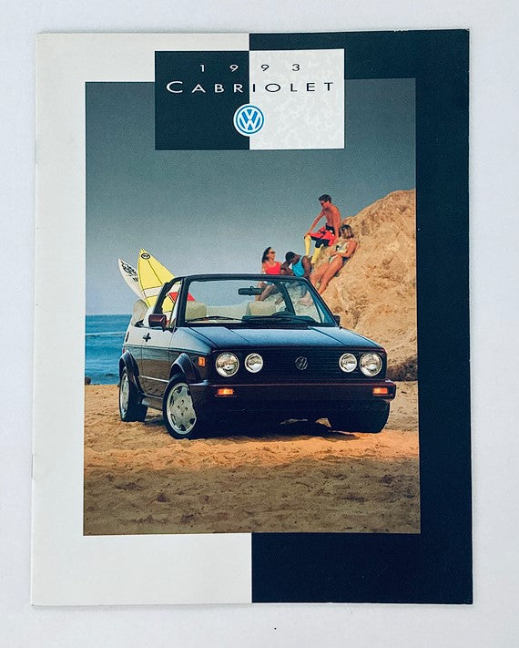 1993 Volkswagen Cabriolet Car Dealer Showroom Sales Brochure featuring a black Cabriolet on the beach, with surfers and beachgoers in the background, showcasing the lively lifestyle associated with the model.