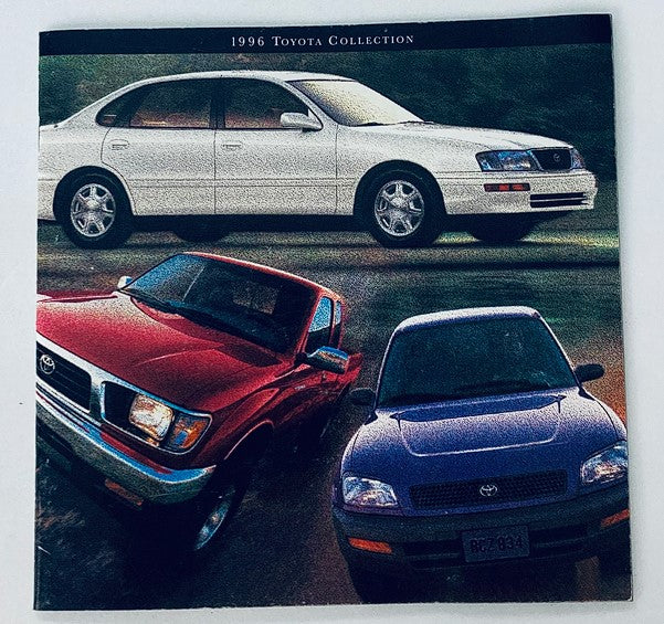 Cover of the 1996 Toyota Collection Dealer Showroom Sales Brochure Guide Catalog featuring three Toyota vehicles: a white sedan, a red pickup truck, and a blue SUV, showcasing the diverse lineup from Toyota in 1996.