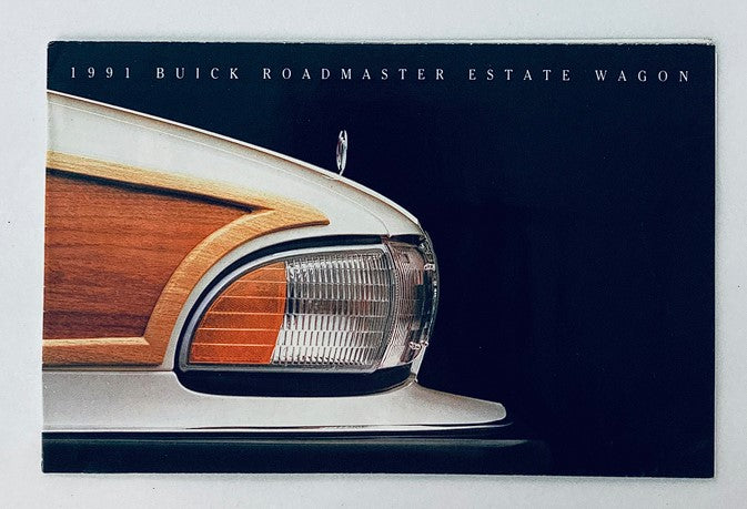 Close-up view of the 1991 Buick Roadmaster Estate Wagon, highlighting the classic design elements and wood accents featured in the Dealer Showroom Sales Brochure Guide Catalog.