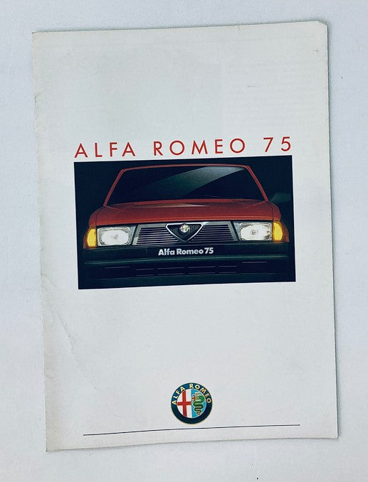 Cover image of the 1988 Alfa Romeo 75 Car Dealer Showroom Sales Brochure Guide Catalog featuring the front view of the Alfa Romeo 75, highlighting its iconic design.