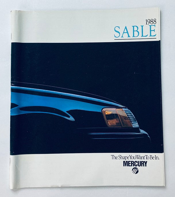 1988 Mercury Sable Car Dealer Sales Brochure showcasing the sleek design and distinctive features of the vehicle. The cover highlights the front profile and stylish headlight, inviting potential buyers to explore the specifications and offerings of the Mercury Sable.