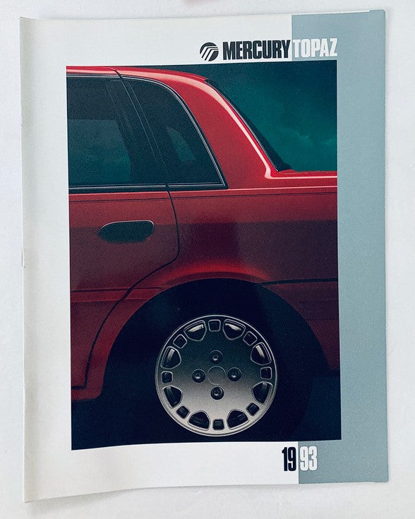 1993 Mercury Topaz Car Dealer Showroom Sales Brochure showcasing a vibrant red Mercury Topaz vehicle with a close-up of its wheel, perfect for collectors or fans of vintage cars.