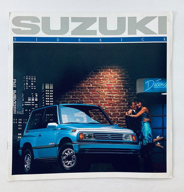 1989 Suzuki Sidekick Car Dealer Showroom Sales Brochure Guide Catalog featuring a vibrant blue Suzuki Sidekick car, posed with a couple in front of an urban backdrop, highlighting the vehicle's design and style.