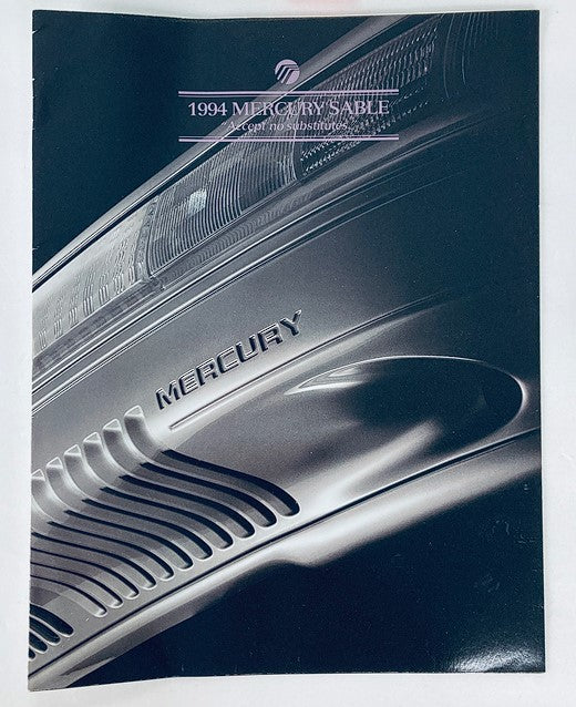 Cover of the 1994 Mercury Sable Dealer Showroom Sales Brochure showcasing the vehicle's sleek front design and branding.