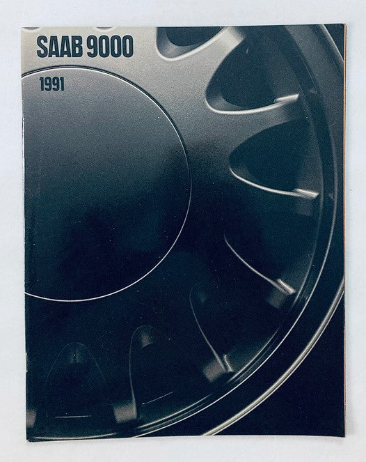 1991 Saab 9000 Car Dealer Showroom Sales Brochure featuring a sleek wheel design on the cover.