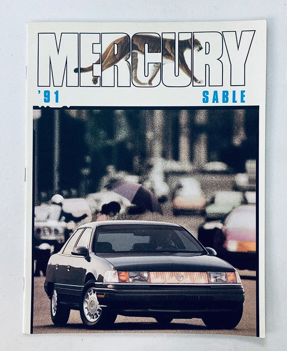 1991 Mercury Sable Dealer Showroom Sales Brochure showcasing a sleek black Mercury Sable car on an urban street, highlighting the vehicle and dealership details.