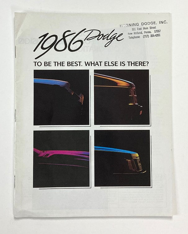 1986 Dodge Dealer Showroom Sales Brochure Guide Catalog cover showcasing the sleek design of Dodge vehicles with vibrant color accents.