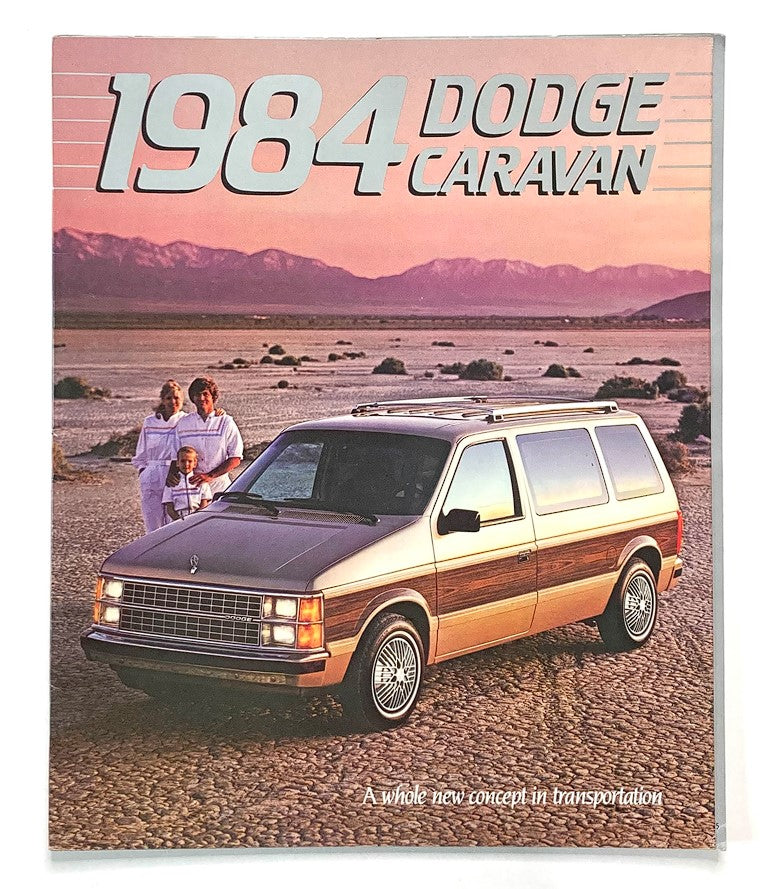 Cover of the 1984 Dodge Caravan Dealer Showroom Sales Brochure Guide Catalog featuring the vintage Dodge Caravan vehicle in a scenic setting, emphasizing its new concept in transportation.