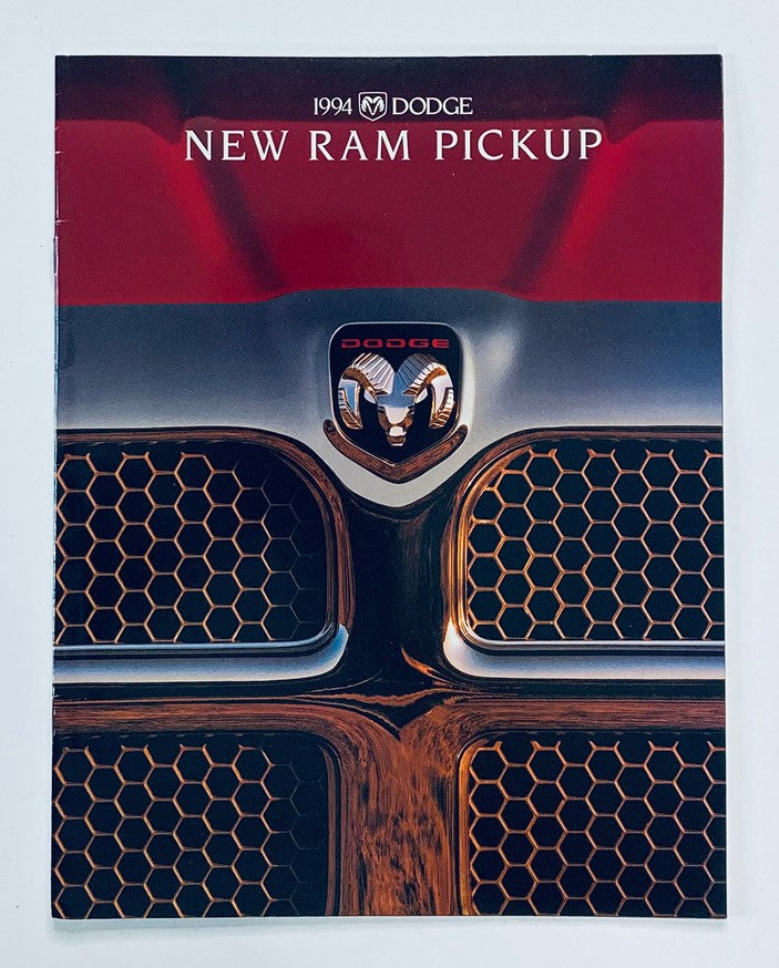 Cover of the 1994 Dodge New Ram Pickup Dealer Showroom Sales Brochure, featuring the iconic Dodge logo and a close-up of the vehicle's grille design.