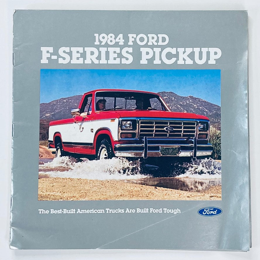 1984 Ford F-Series Pickup dealer showroom sales brochure guide catalog cover featuring a red and white pickup truck splashing through water, showcasing the rugged design and durability of Ford trucks.