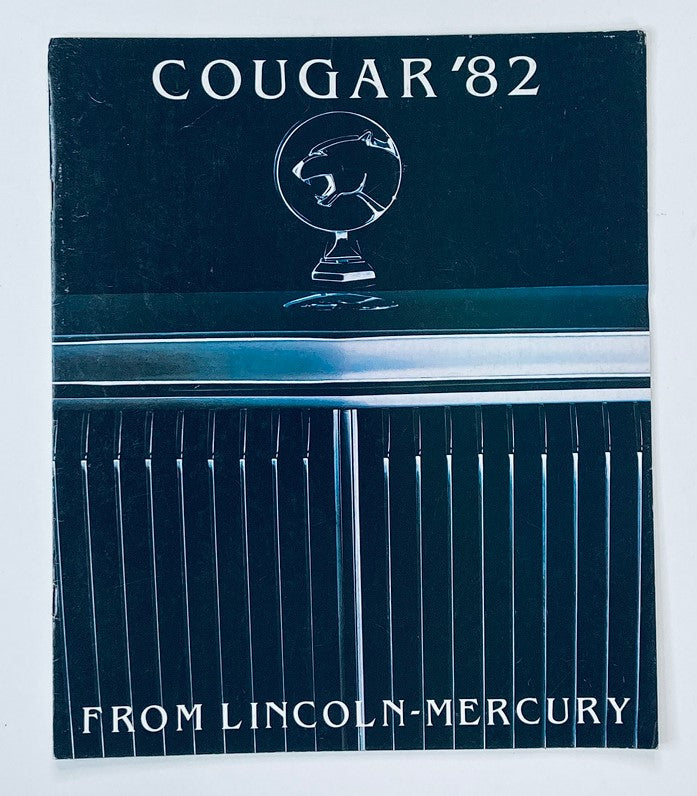 Cover of the 1982 Lincoln-Mercury Cougar Dealer Showroom Sales Brochure Guide Catalog, featuring a sleek design with a stylized cougar emblem.