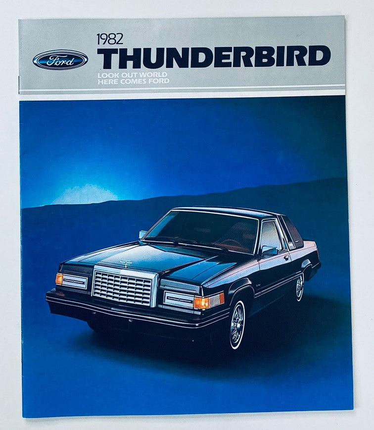 1982 Ford Thunderbird Dealer Showroom Sales Brochure Guide Catalog featuring a blue background image of the 1982 Ford Thunderbird car.