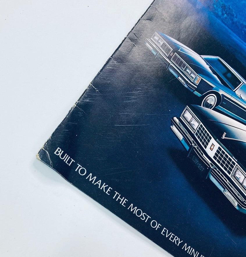 Close-up view of the 1980 Oldsmobile Delta-88 Dealer Showroom Sales Brochure, emphasizing the tagline 'Built to Make the Most of Every Minute You Drive in Today's World'.