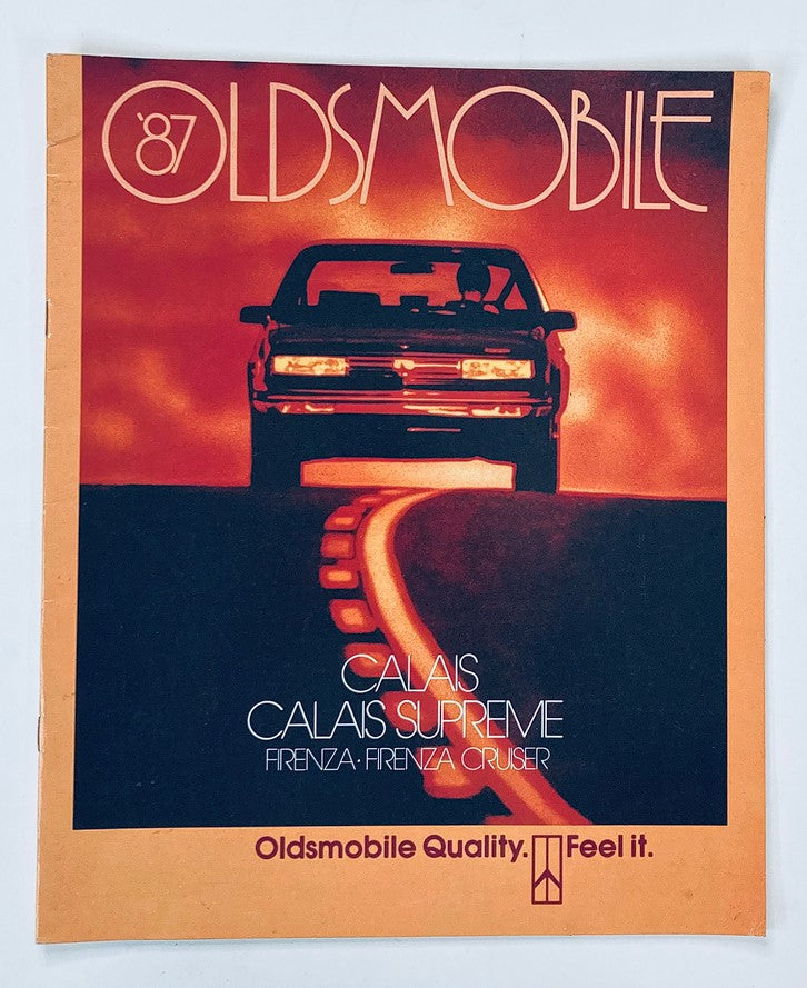 1987 Oldsmobile Calais Dealer Showroom Sales Brochure Guide Catalog showcasing a striking cover design featuring a silhouette of a car on an illuminated road, representing the Calais and Calais Supreme models.