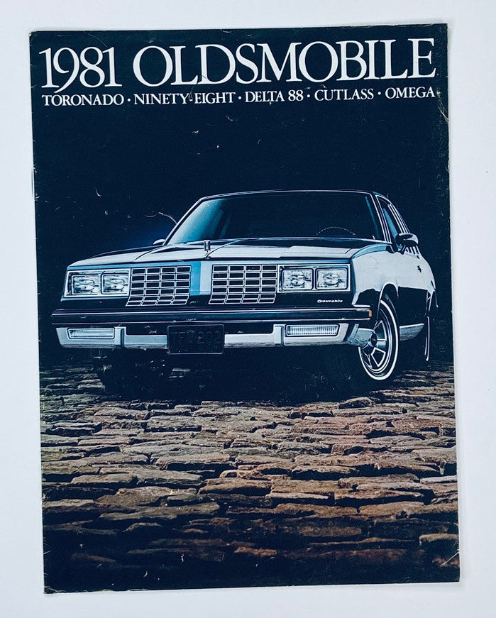 1981 Oldsmobile Toronado Dealer Showroom Sales Brochure with a vintage car on the cover, showcasing Oldsmobile models.