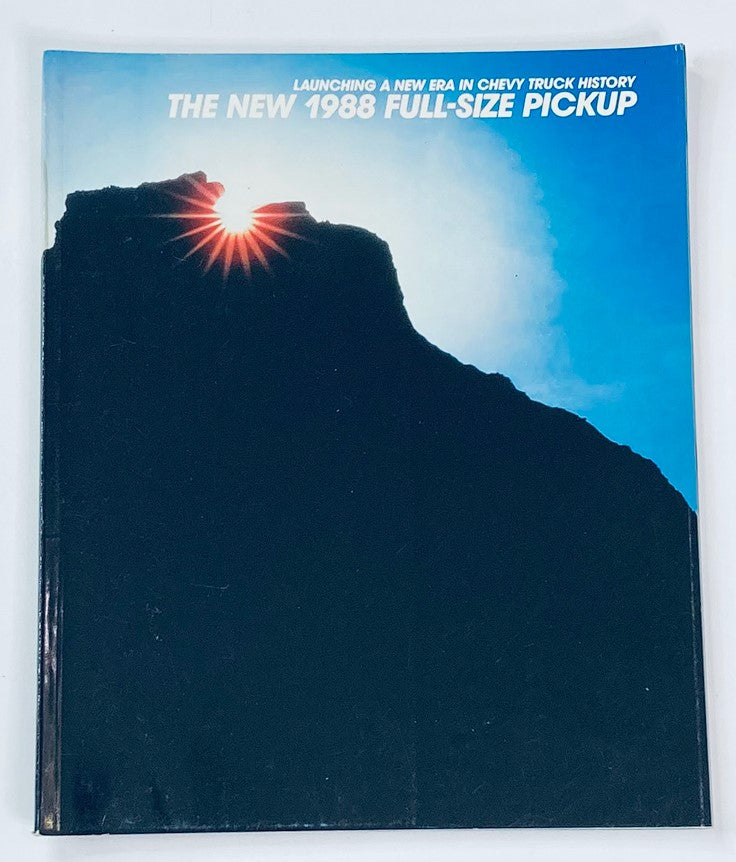 Cover of the 1988 Chevrolet Full-Size Pickup Dealer Showroom Sales Brochure Guide Catalog featuring a dramatic sunrise over a mountain silhouette, highlighting the launch of the new 1988 full-size pickup.