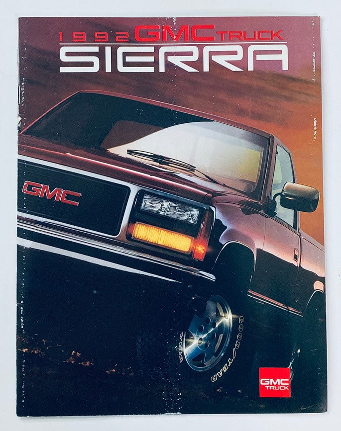1992 GMC Truck Sierra Dealer Showroom Sales Brochure featuring a striking image of a GMC Sierra truck against a dramatic backdrop.