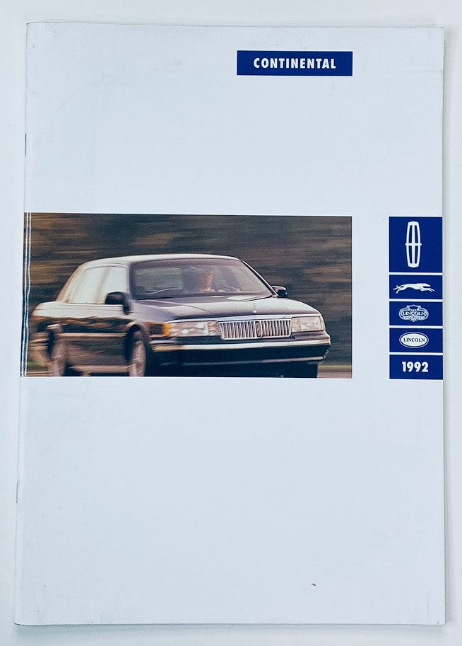 1992 Lincoln Continental Dealer Showroom Sales Brochure Guide Catalog featuring an image of the sleek Lincoln Continental car on the front cover.