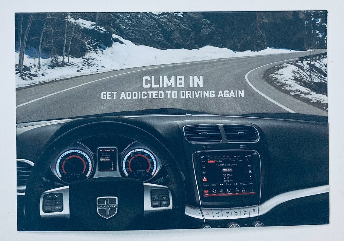 2000s Dodge Journey Dealer Showroom Sales Brochure Guide Catalog featuring a scenic road view and an interior dashboard display, encouraging viewers to 'Climb In' and 'Get Addicted to Driving Again'.