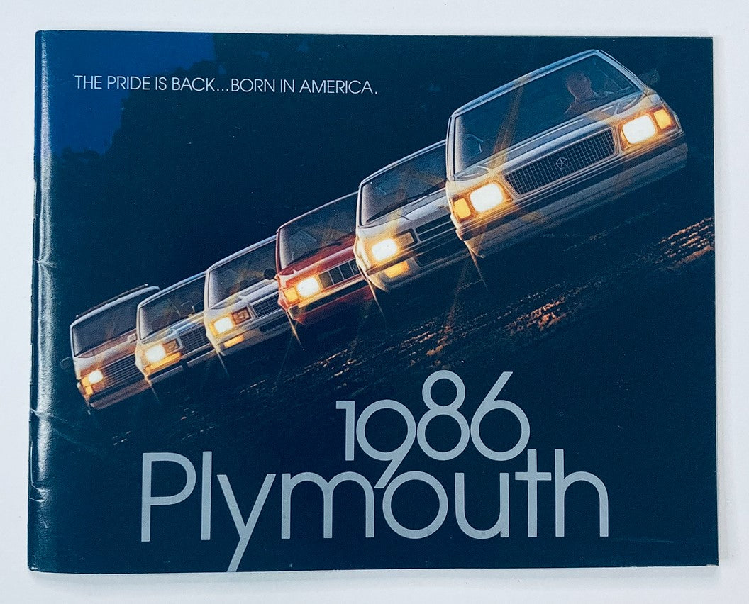 1986 Plymouth Dealer Showroom Sales Brochure Guide Catalog showcasing various models of Plymouth cars in a lineup, emphasizing the tagline 'The Pride is Back... Born in America.'