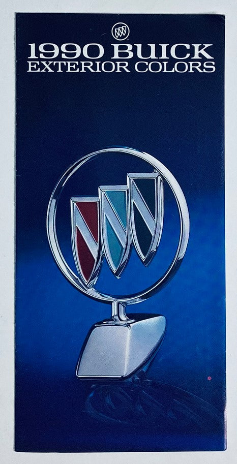 1990 Buick Exterior Colors Dealer Showroom Sales Brochure featuring the iconic Buick emblem showcasing red, white, and blue colors on a sleek blue background.